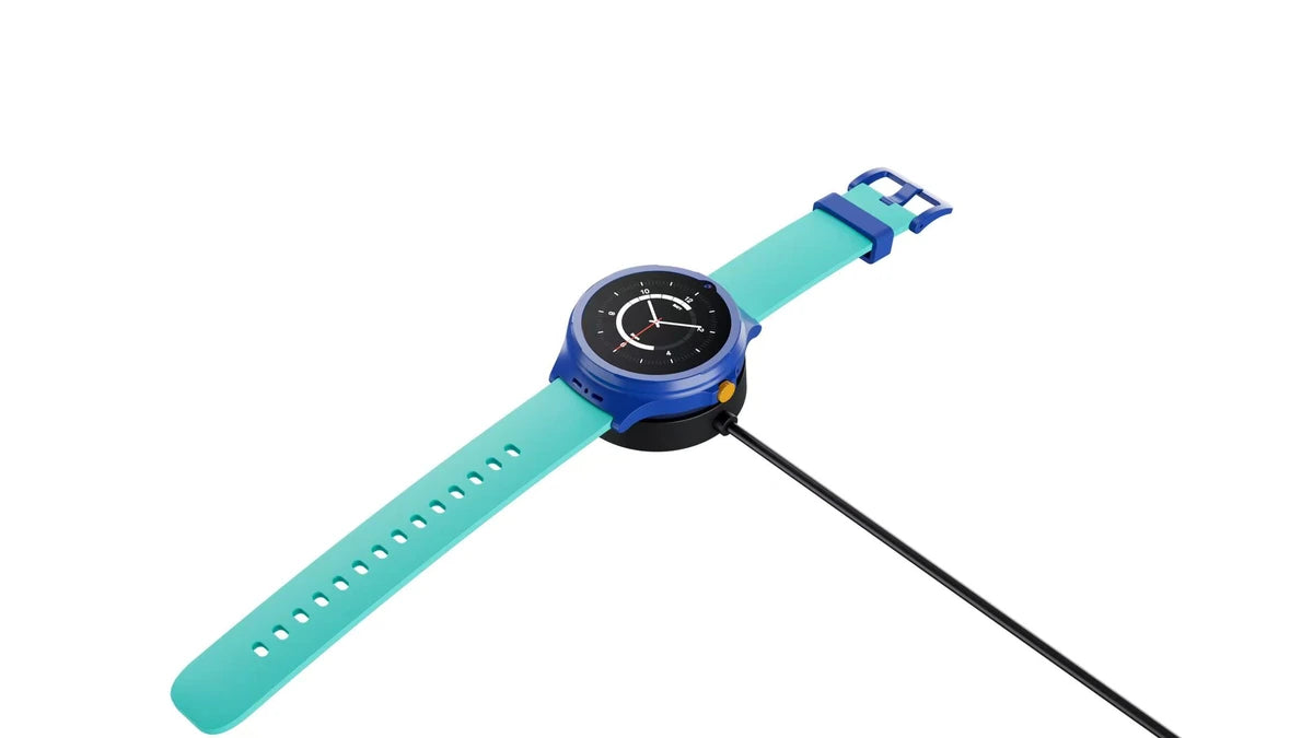 KLOKI Moon watch resting on its magnetic charging dock with a USB-C cable